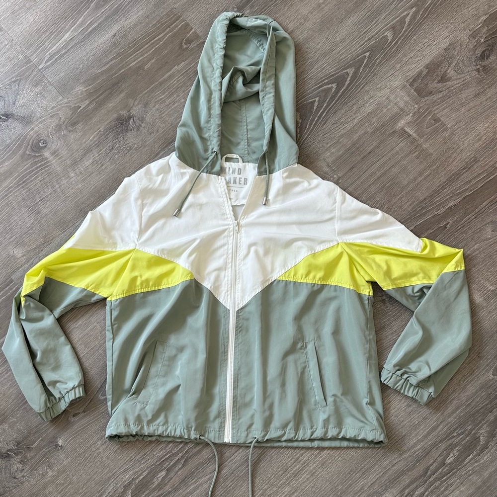 Green yellow and white windbreaker jacket